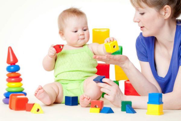 Развитие ребенка с 5 до 6 месяцев: какими играми можно занять кроху
